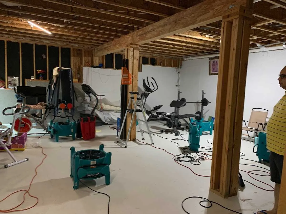 Basement drying equipment setup for Contents Cleaning & Restoration in Elko New Market